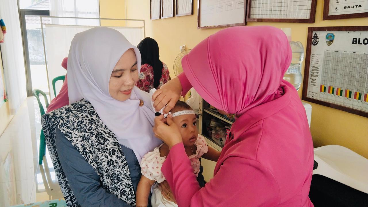 Bidan Hj.Eneng Iyet Kurniawati,S.Keb.,SKM